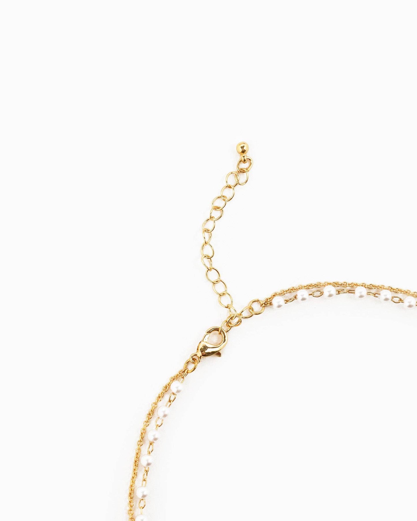 Double Layered Pearl Chain and Bow Pendant Necklace