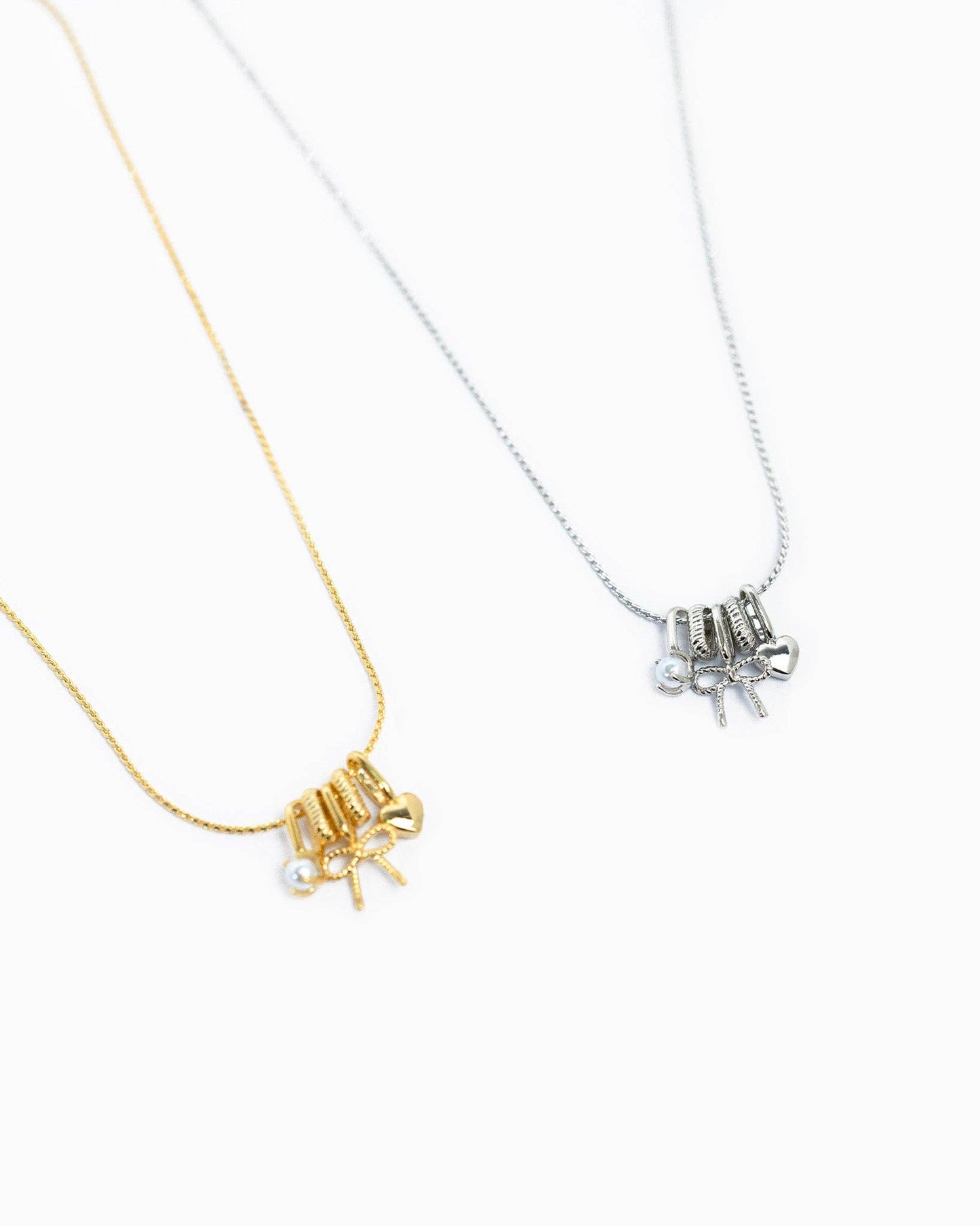 Charmed in Bow Rondelle Necklace: Rhodium