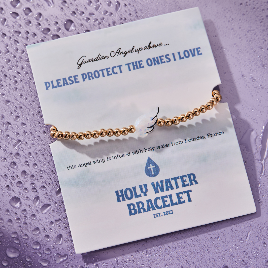 HOLY WATER ANGEL WING BRACELET: Yellow Gold