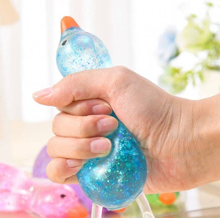 Glitter Duck Squishy- Stretchy Stress Relief Fidget Toy - restock 5/19: Pink