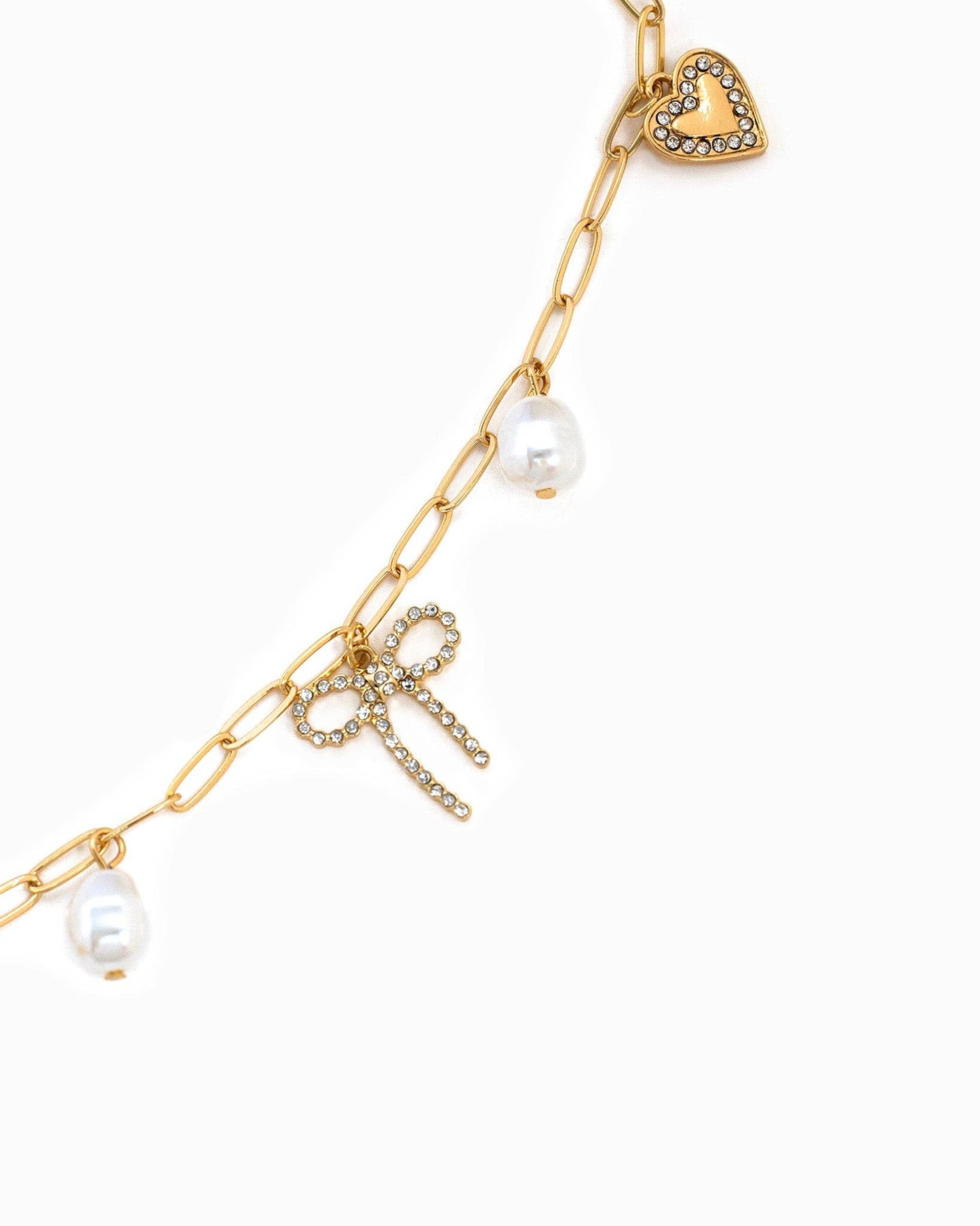 Multi Pearl Bow Charm Necklace: Rhodium