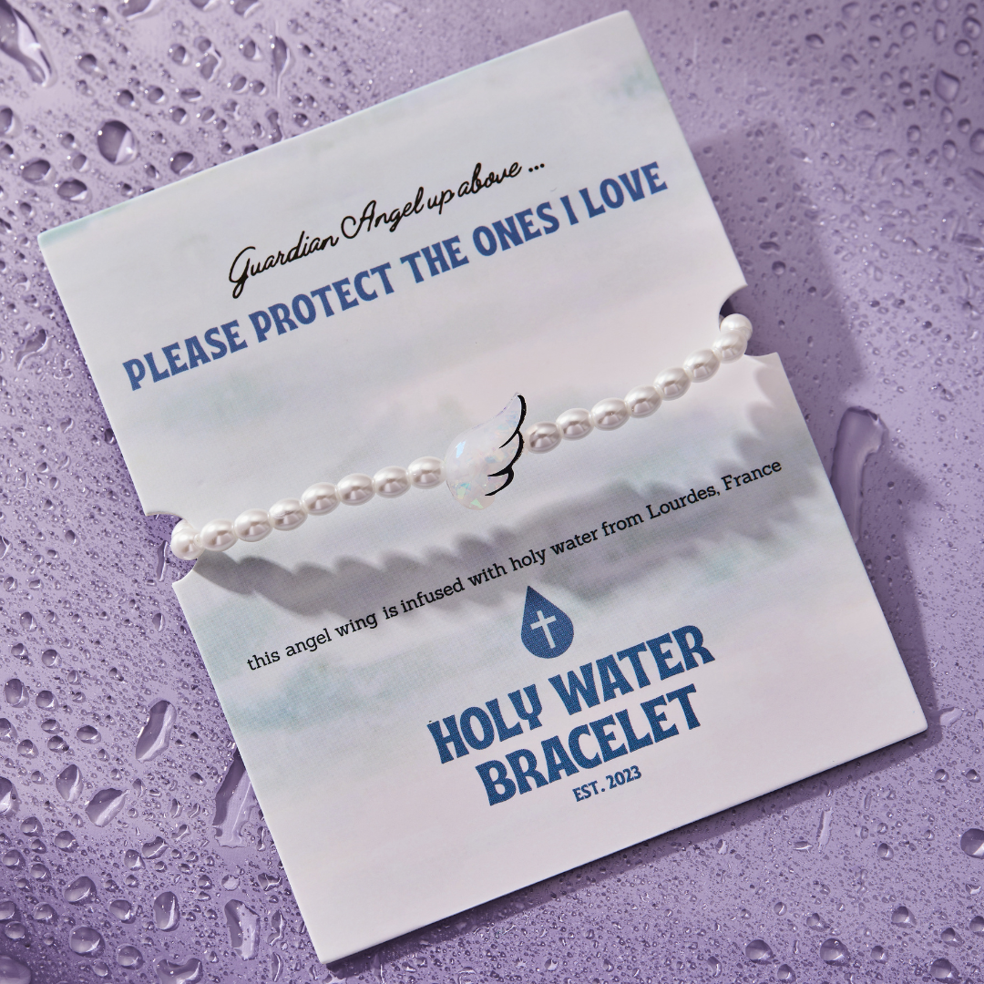 HOLY WATER ANGEL WING BRACELET: Yellow Gold
