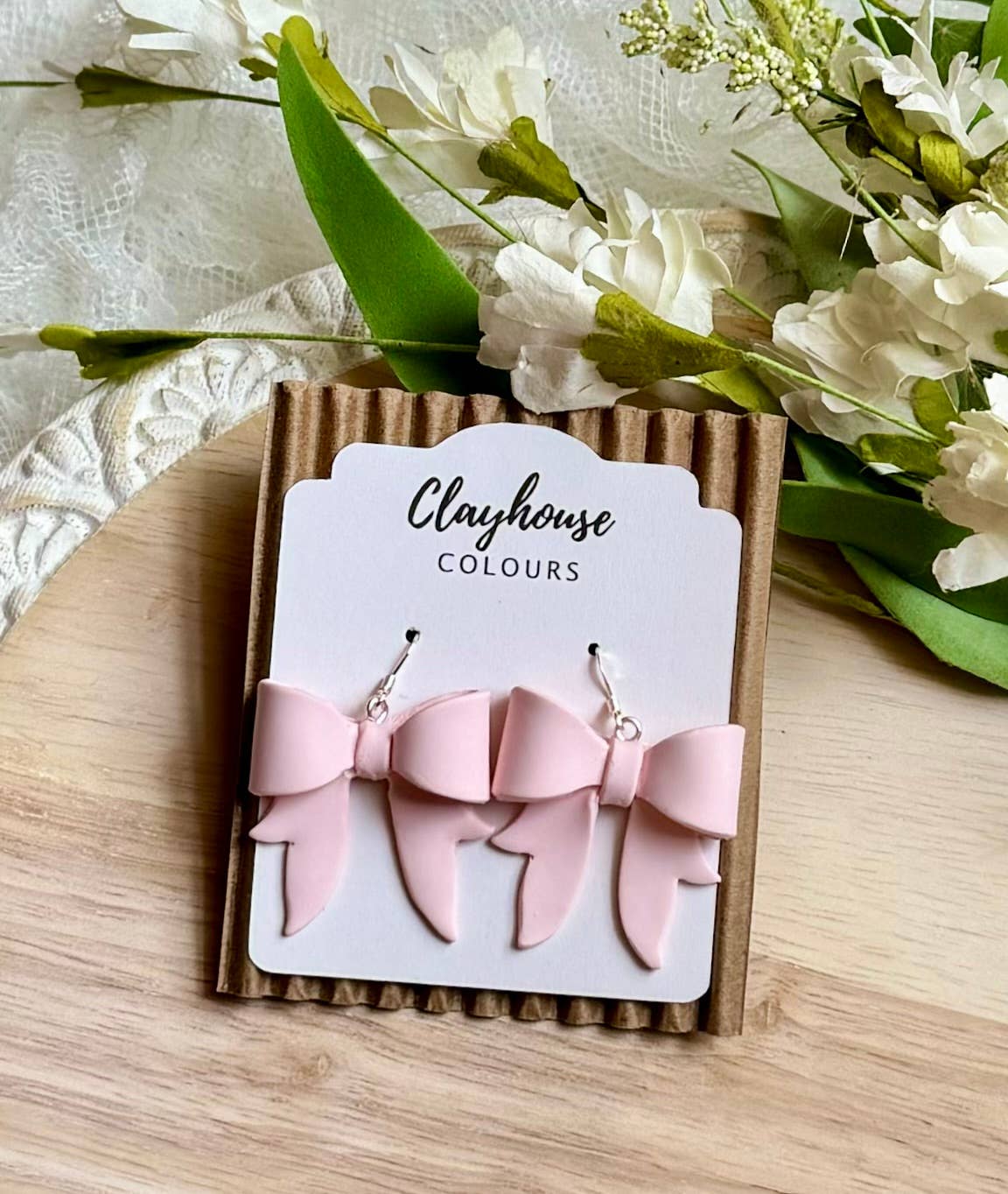 Bow Earrings: White / Sterling Silver Plated
