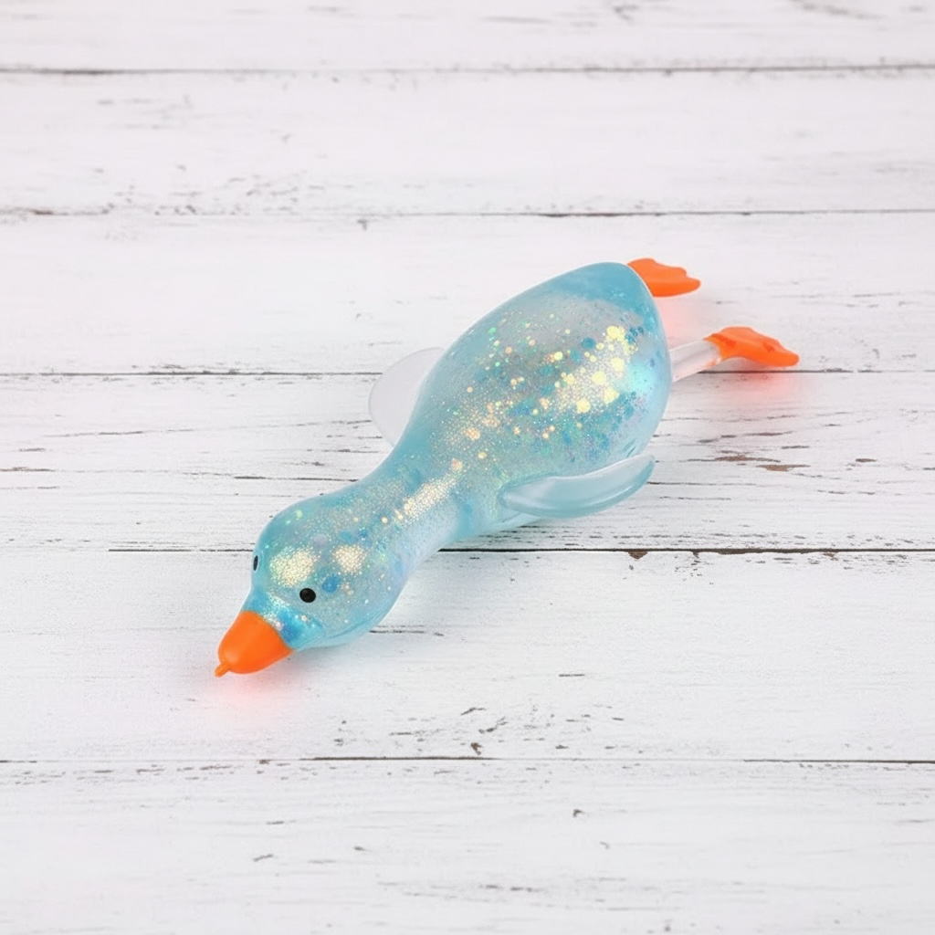 Glitter Duck Squishy- Stretchy Stress Relief Fidget Toy - restock 5/19: Pink