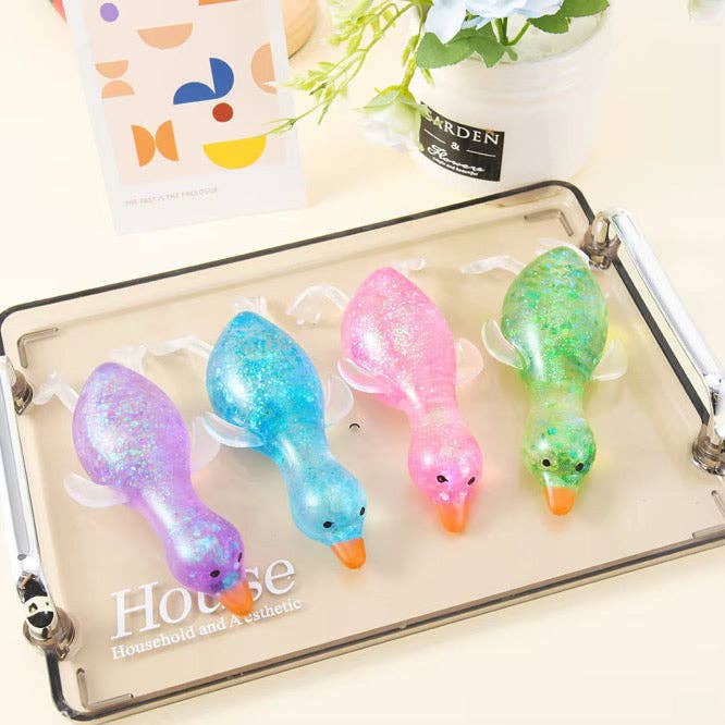 Glitter Duck Squishy- Stretchy Stress Relief Fidget Toy - restock 5/19: Pink