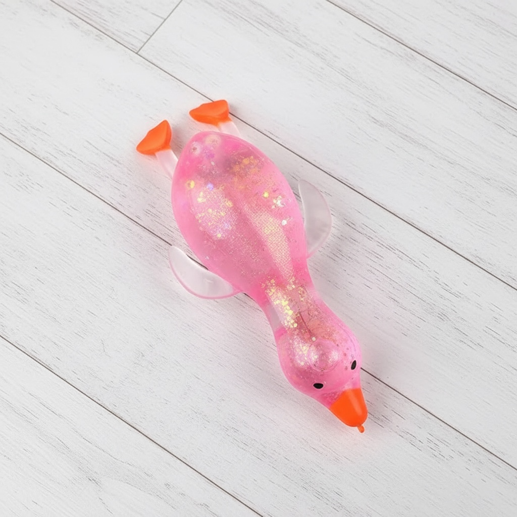Glitter Duck Squishy- Stretchy Stress Relief Fidget Toy - restock 5/19: Pink