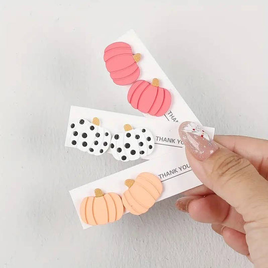 Retro Pumpkin Stud Earrings: Black and White Dots